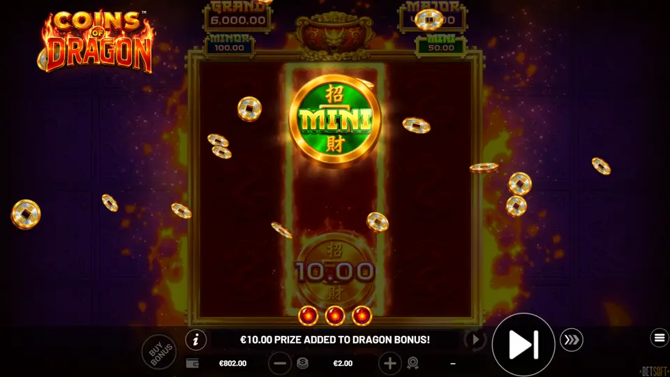 Dragon Bonus collecting a MINI symbol during Coins of Dragon Hold & Win respins